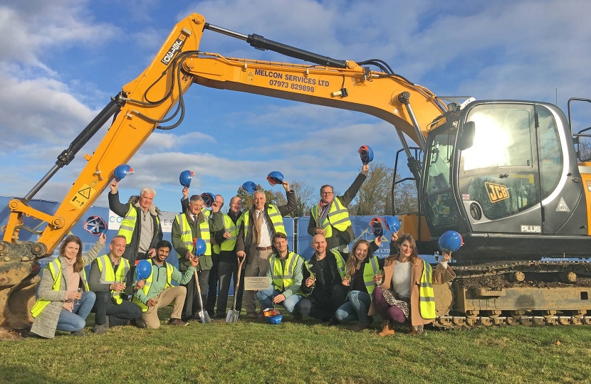 Getting ready for action.  Representatives from South Cambridgeshire District Council, Cool Venues, Cambridge Leisure and Ice Centre, Marshall of Cambridge, operator GLL and members of the Cambridge University Men’s and Women’s Ice Hockey teams – some of the many people who have brought the Cambridge Ice Rink from a wish list to the point where construction is about to start.  Photo credit: South Cambridgeshire District Council.