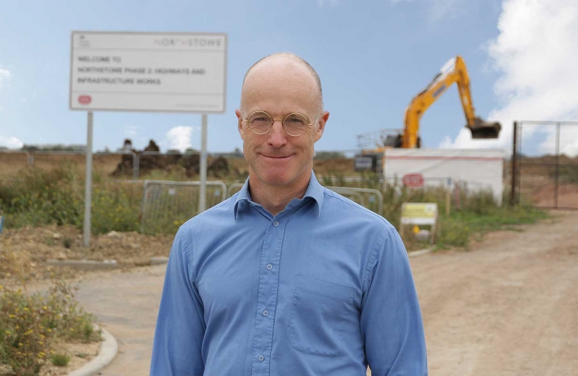 History day – the lonely digger behind County Councillor Tim Wotherspoon on 22nd August 2018 is a positive sign work on phase two Northstowe has really begun. 