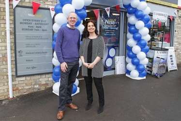 Simon Edwards, Cottenham District Councillor and SCDC's Finance and Staffing Portfolio Holder, with Heidi Allen MP outside the post office in Oakington. 