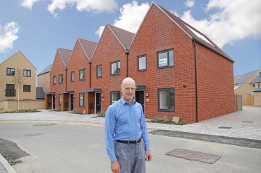 Conservative County Councillor Tim Wotherspoon outside the new shared ownership houses in Northstowe phase one.  Tim was a key player in the planning of Northstowe and helped to secure 41% affordable housing for the first two phases.  Tim Wotherspoon is County Councillor for Cottenham, Rampton and Willingham.